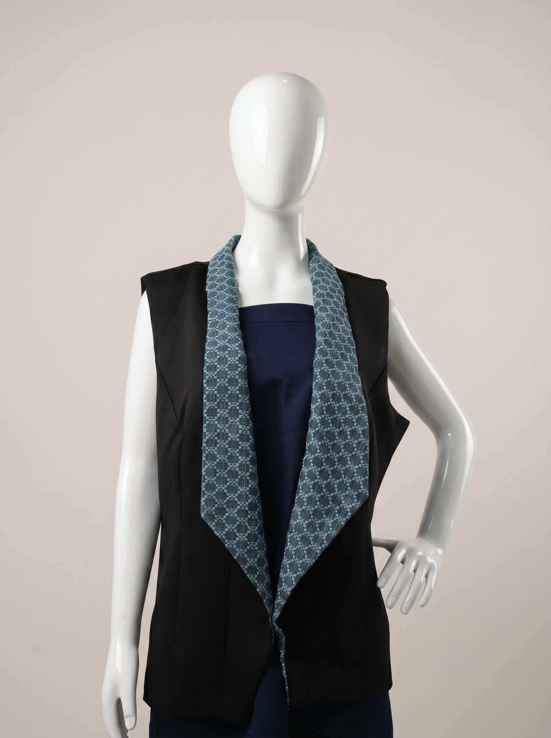 Maxima – Matte Black Sleeveless Blazer with Exaggerated Lapel and Inabel Accents
